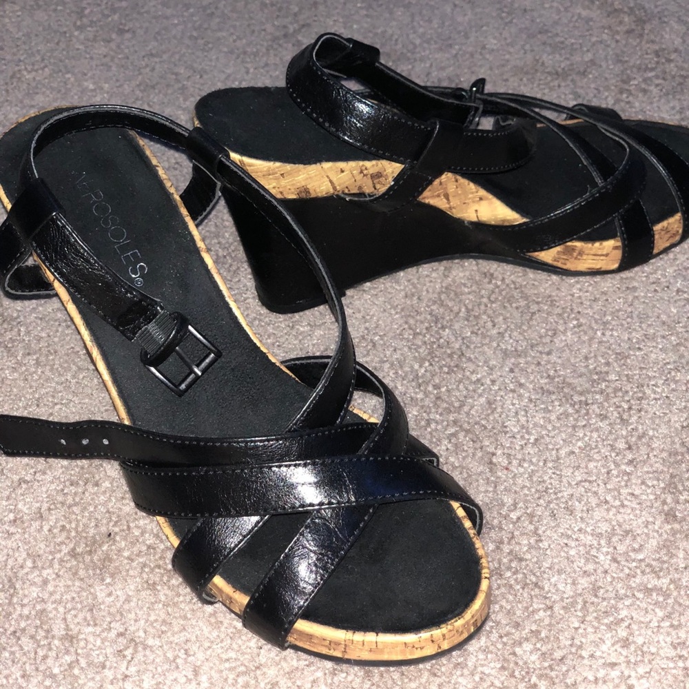 heels with small buckle on side for a comfy fit.